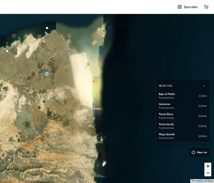 ONDA spot atlas over north Fuerteventura, with orange markers for spots that have photos and a Near you list